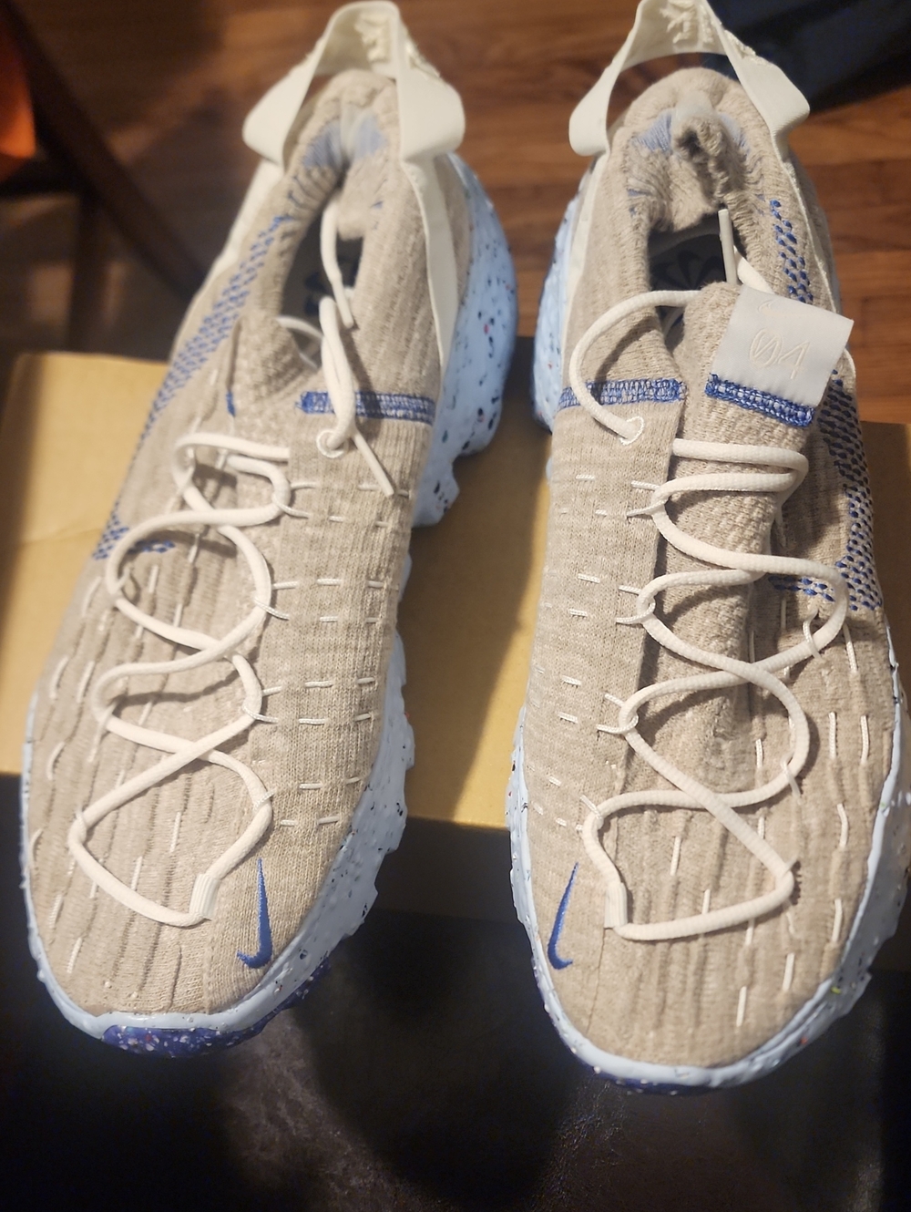 Nike Beige Knit Sneakers with Blue Accents